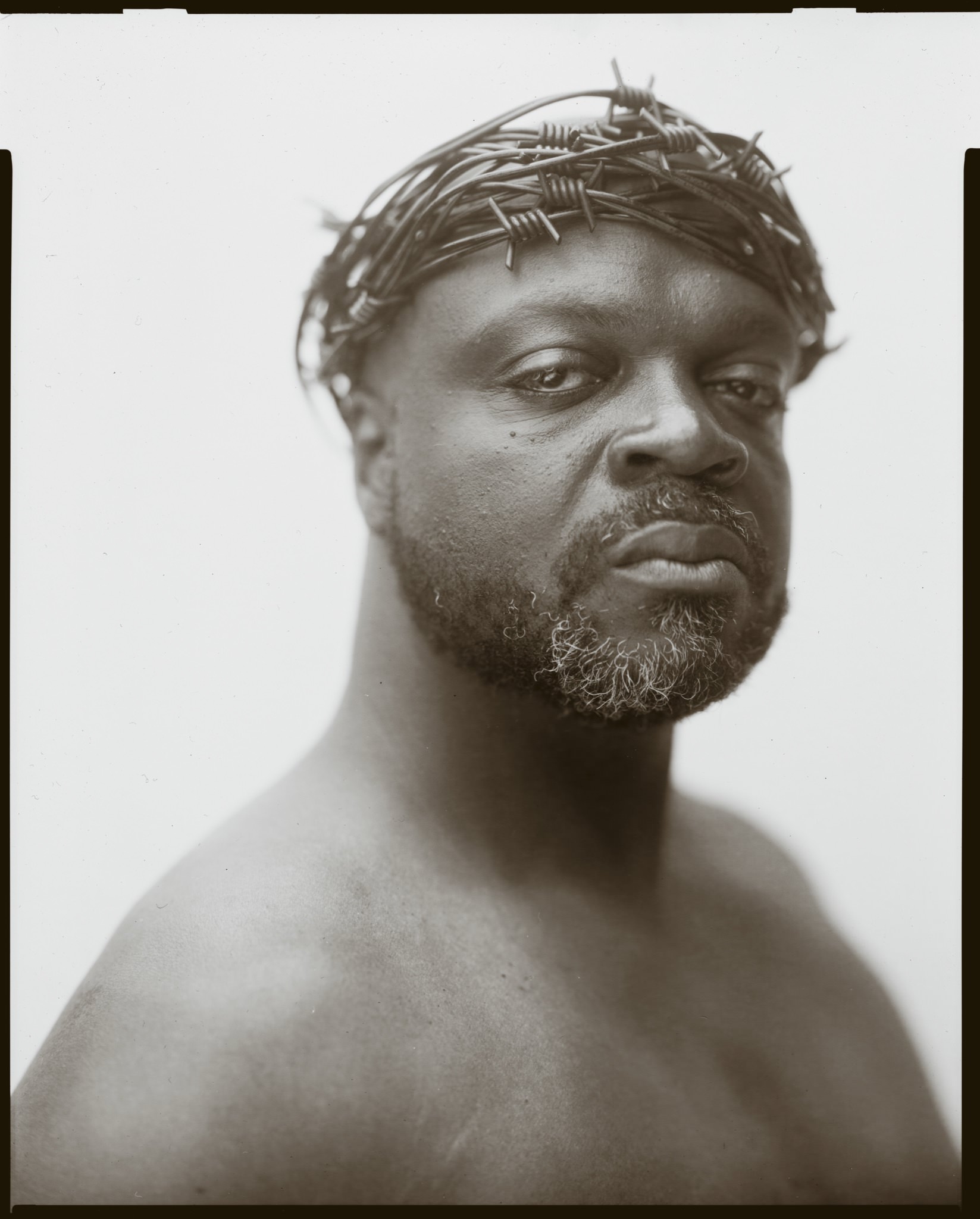 Conceptual black-and-white portrait of Kofi Amoa