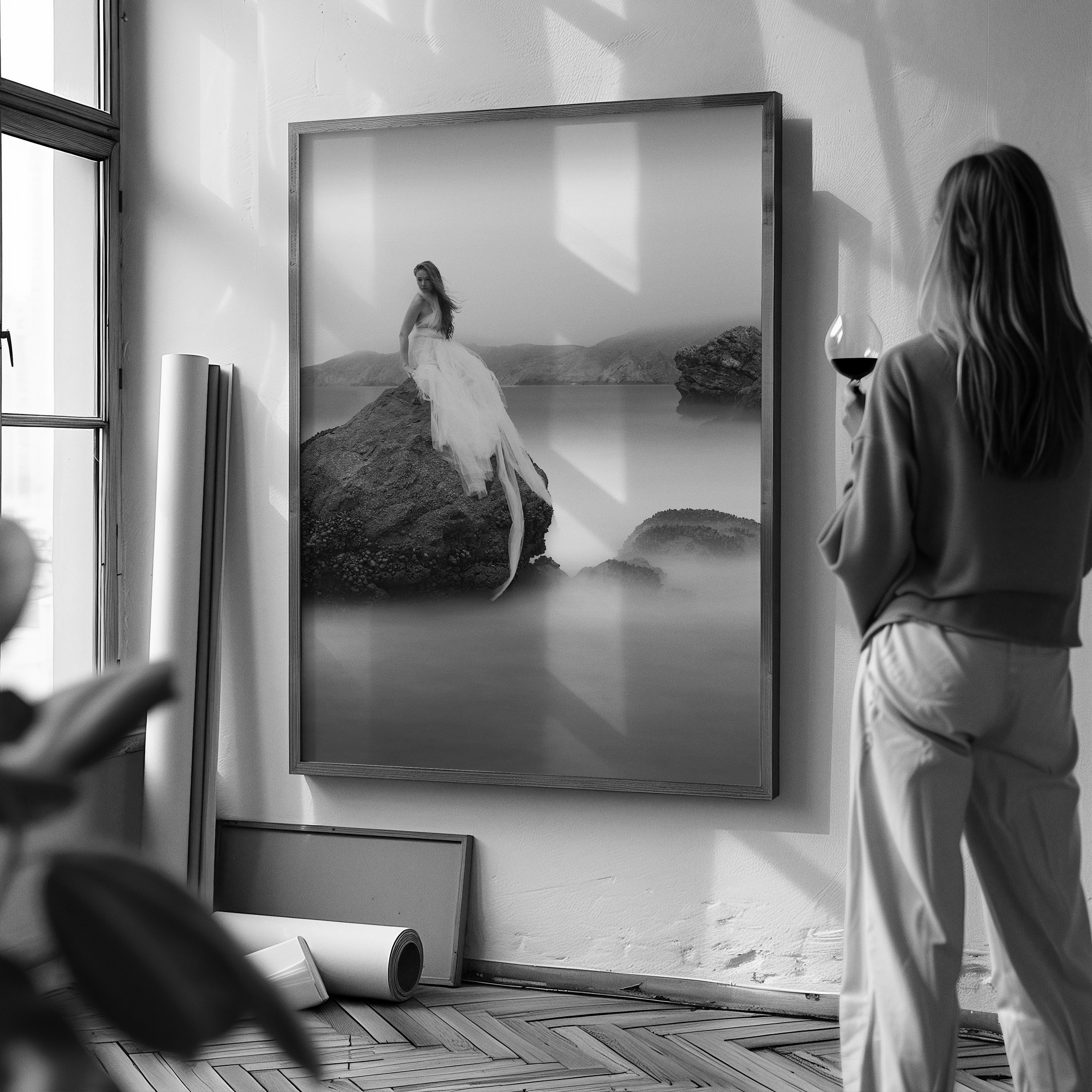 Black and white portrait artwork installed in a refined interior