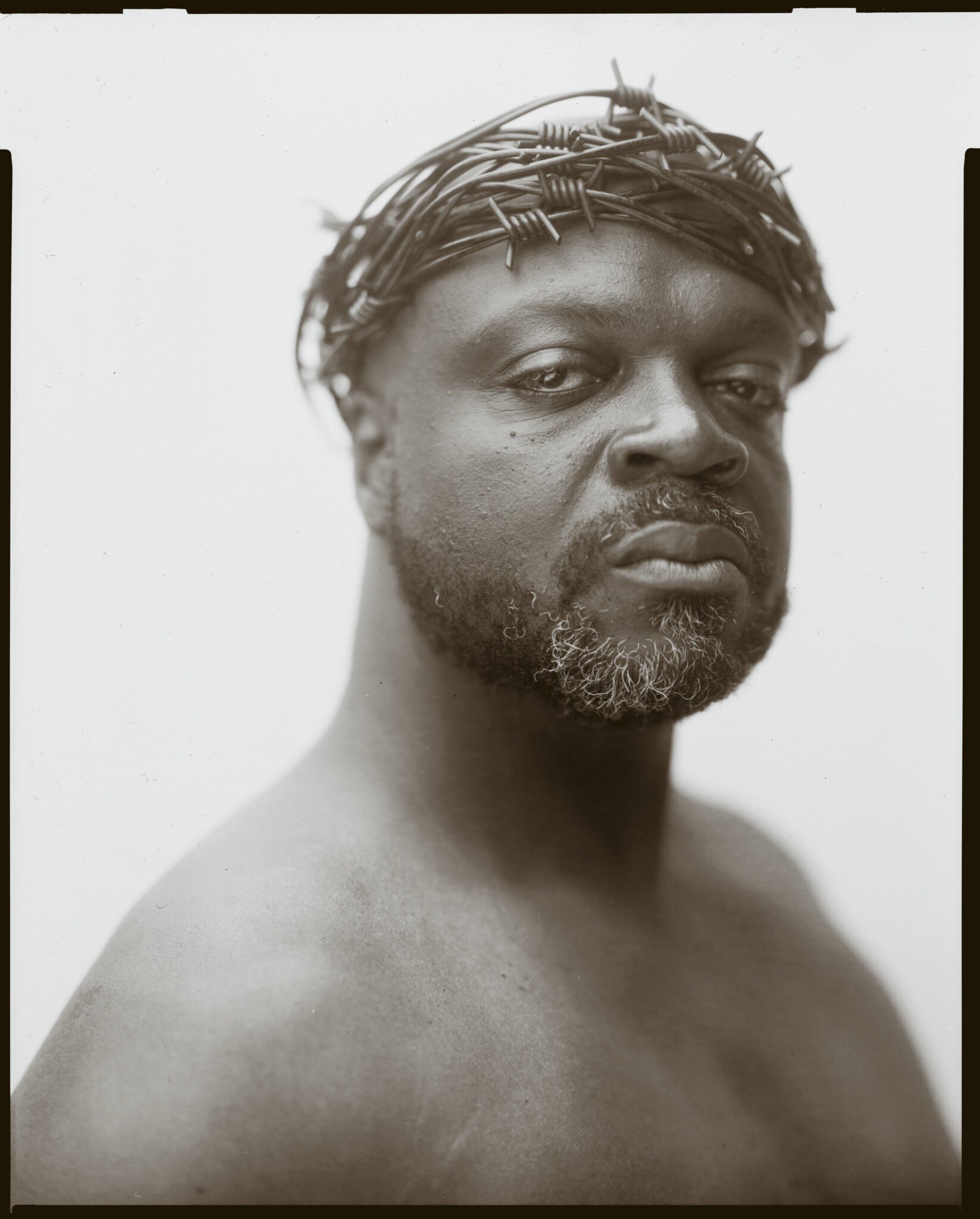 Fine-art black and white portrait of Kofi Amoa