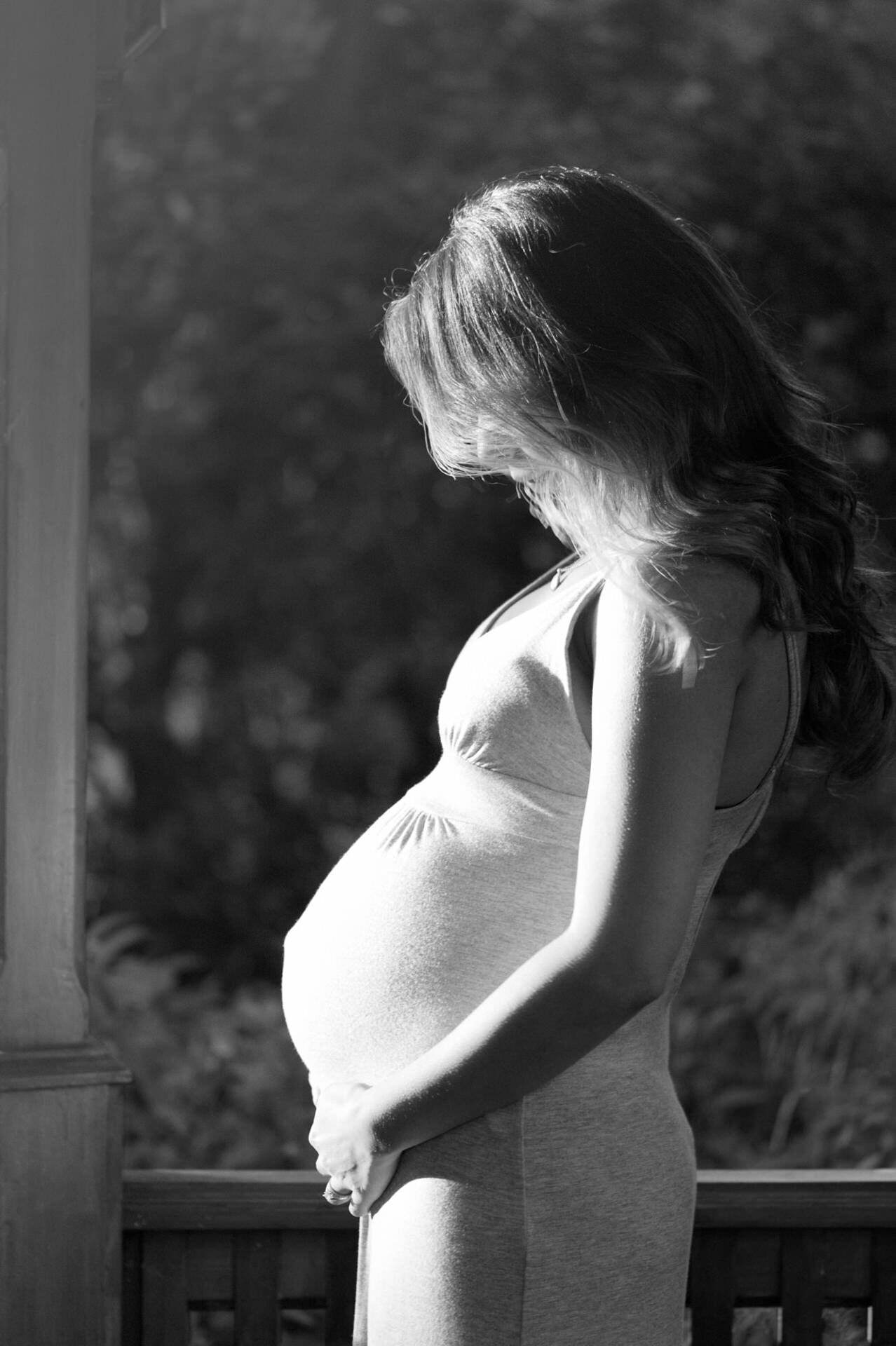 Black and white outdoor maternity portrait