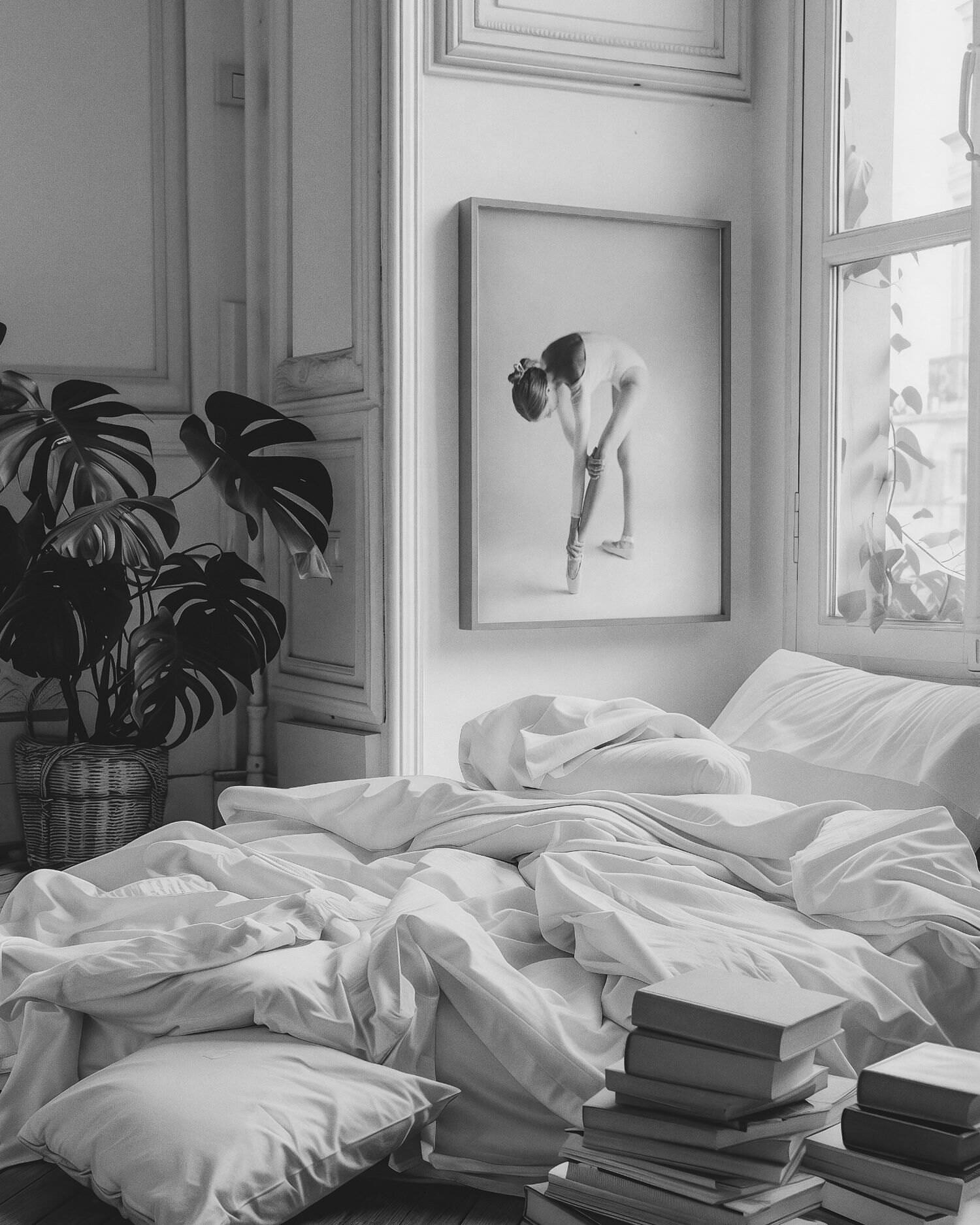 Framed portrait artwork in a bedroom