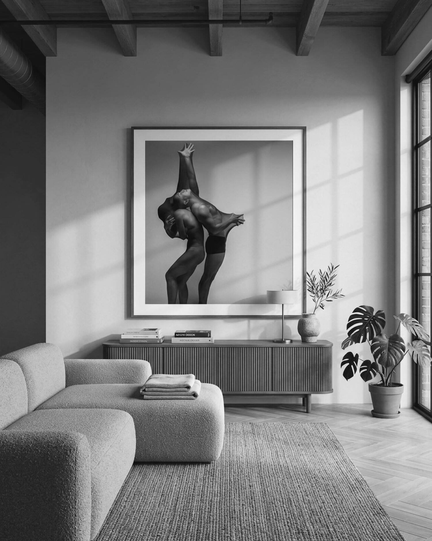 Large framed portrait above a sofa