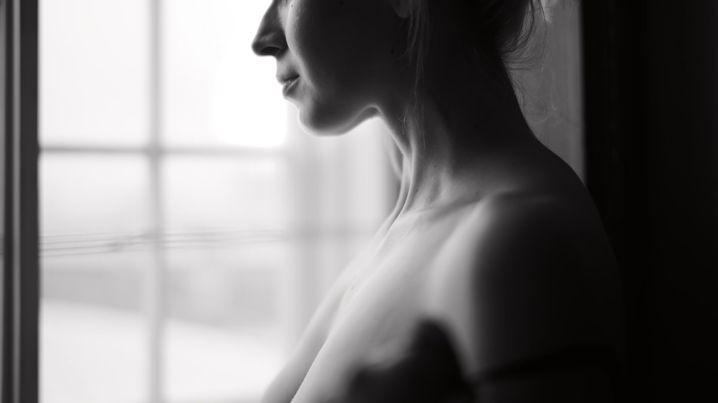 Melinda standing in black and white