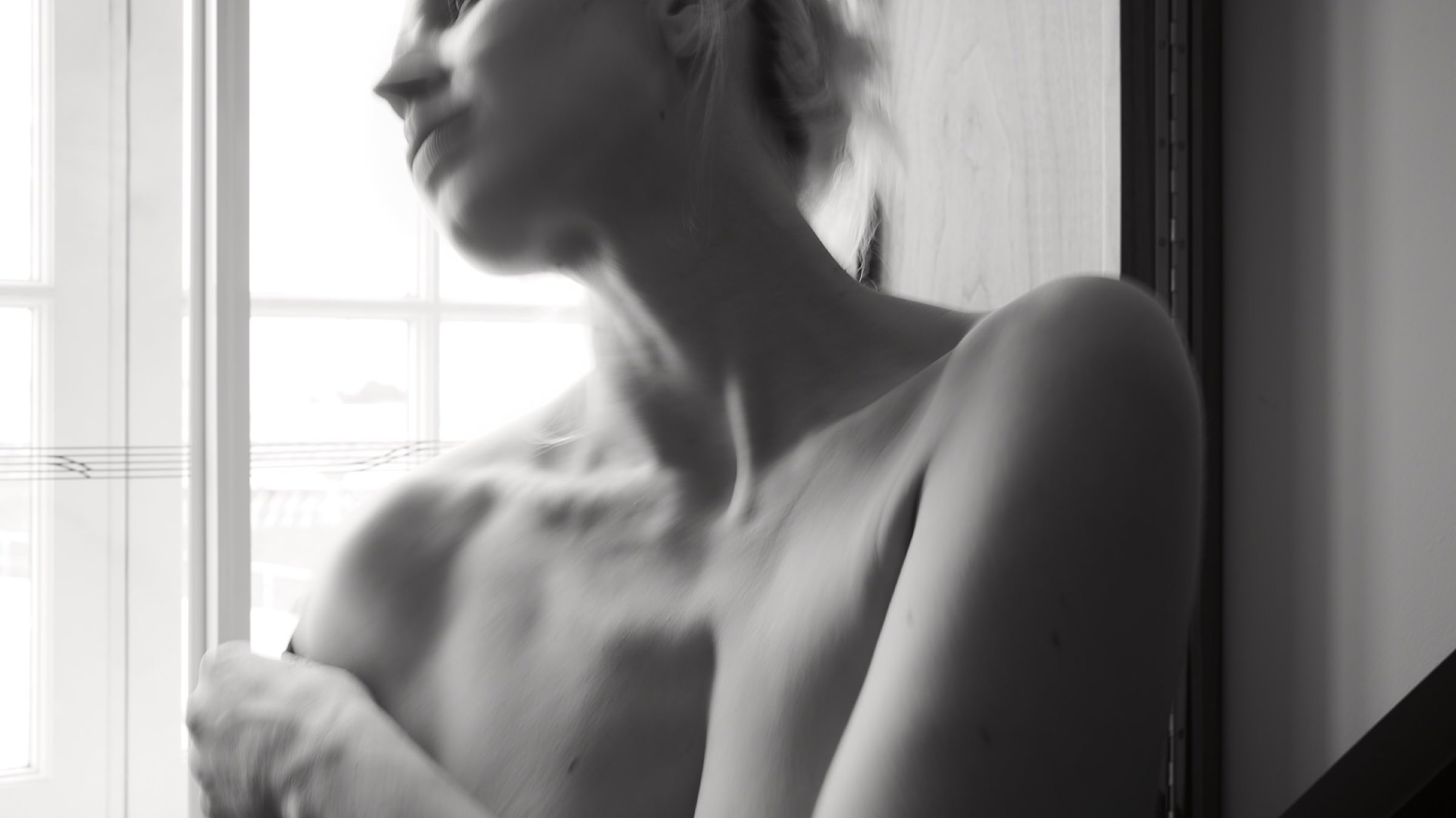 Melinda seated portrait in black and white