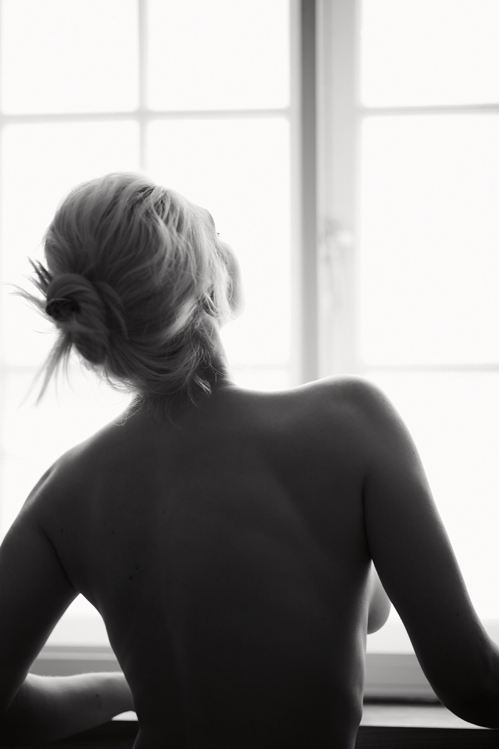Melinda black and white doorway portrait
