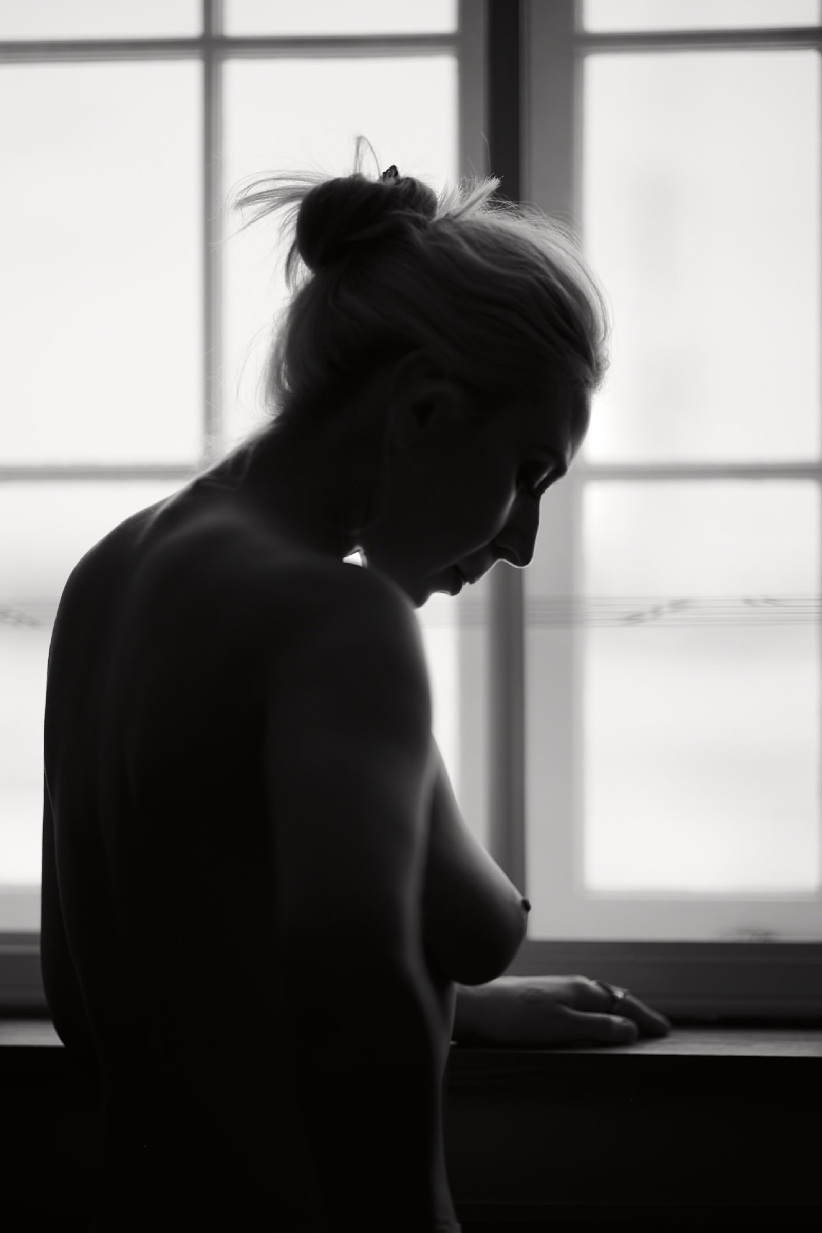 Melinda reflected in the window