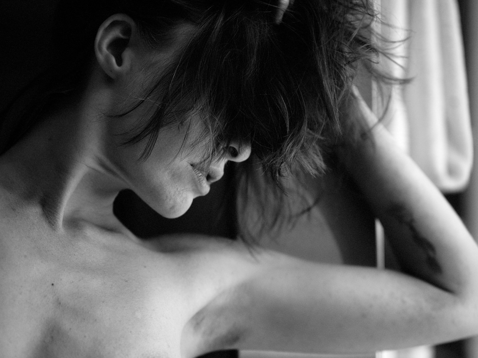 Black and white portrait in a quiet room