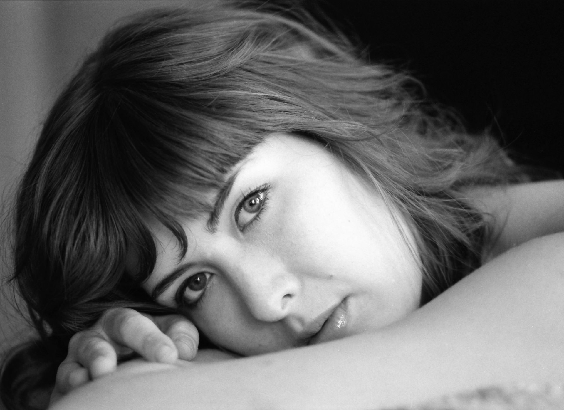 Candid black and white portrait in domestic light