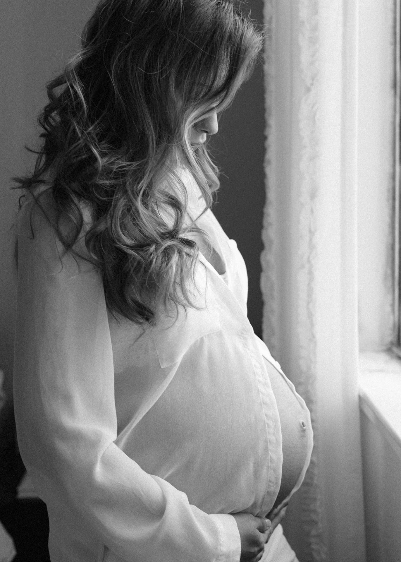 Vertical black and white portrait in home light